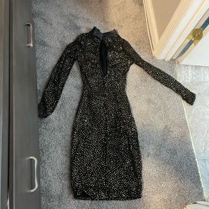 Women’s dress glittery gold and black. Perfect for a date night. Worn one time.